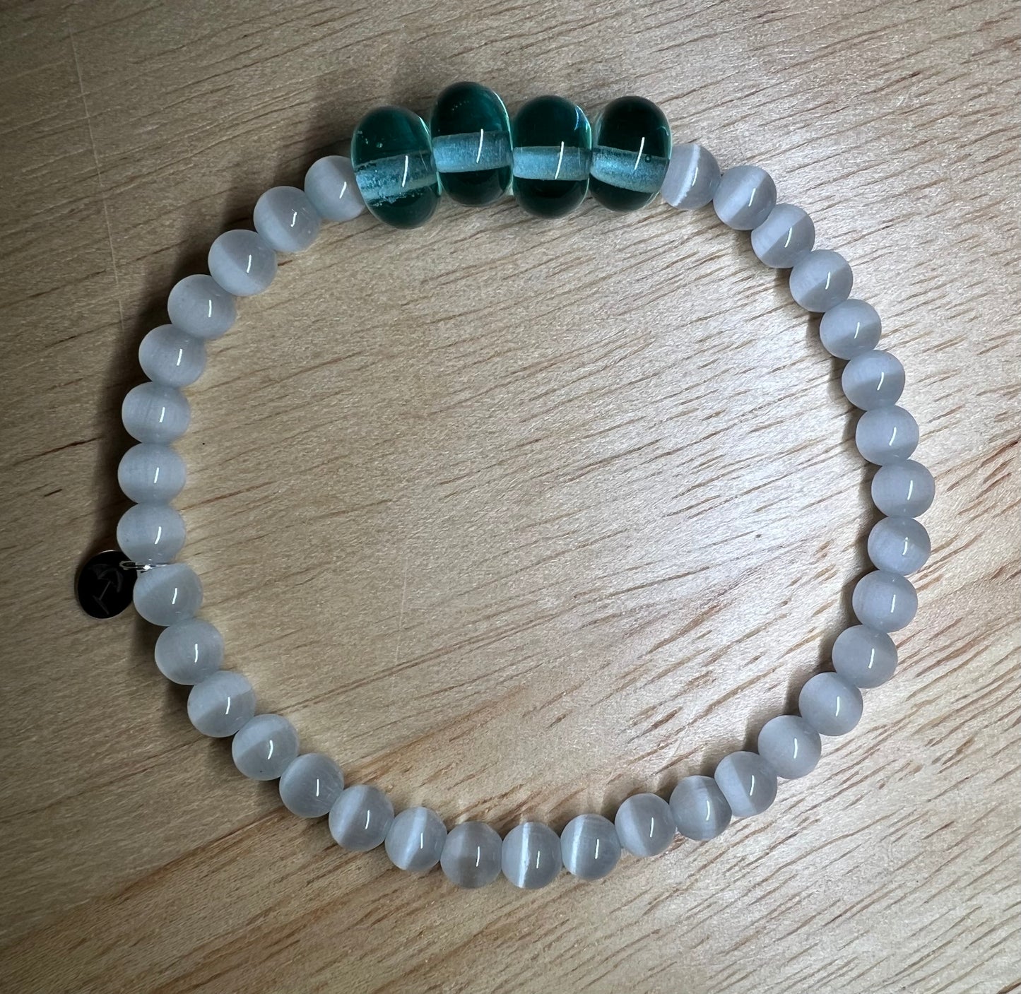 The White Cat Eye Gemstone Bracelet 
(with hand blown Light Blue Glass Beads)