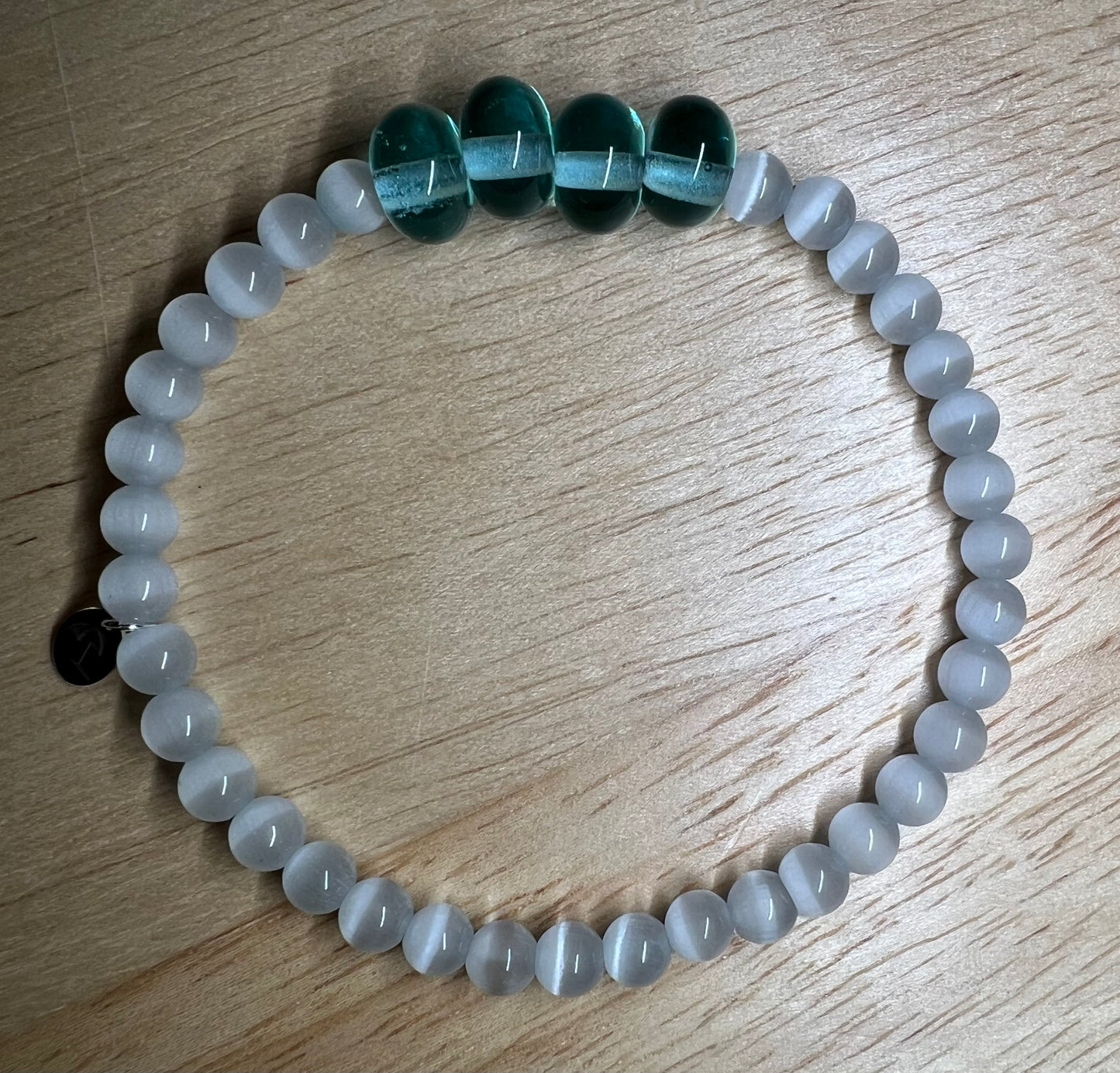 The White Cat Eye Gemstone Bracelet 
(with hand blown Light Blue Glass Beads)