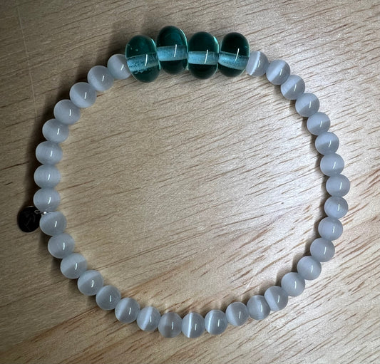 The White Cat Eye Gemstone Bracelet 
(with hand blown Light Blue Glass Beads)